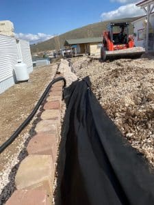 Read more about the article French Drains 101: Solving Drainage Issues with Ease